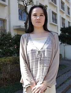 Junko Nishimura is an Asian lady presenting