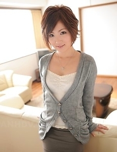 Kaede Oshiro with busy mouth shows sexy legs