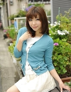 Juri Kitahara in blue sweater and lace skirt