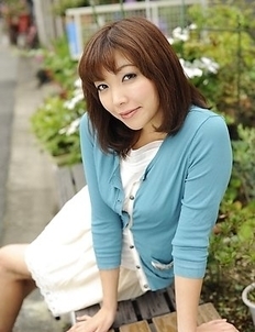 Juri Kitahara in blue sweater and lace skirt