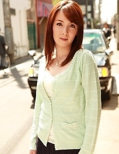 Chika Sasaki in green sweater and short skirt