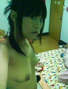 Asian chick teasing and self-shooting naked