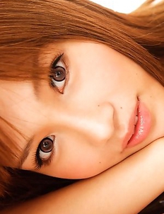 Anna Anjyo takes hot ass and racy cans out of pink lingerie