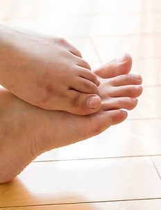 Long-legged bombshell Mio Yoshida showing her panties and hot soles