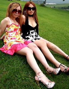 Cute Japanese babes pose outdoors