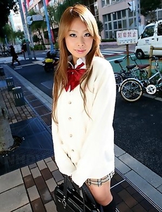 Remika Uehara poses on the street