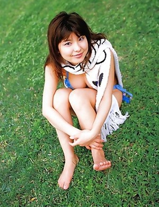 Miri Hanai shows huge melons in tiny lingerie on grass