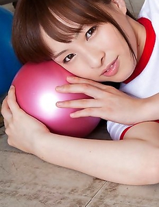 Maho Kiruma with sexy ass in shorts plays with the ball