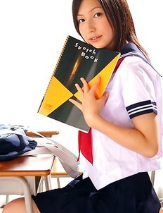 Kaori Ishii is naughty and shows legs under uniform skirt
