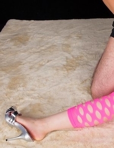 Yuma Miyazaki posing in black stockings and heels, looking seductive as fuck