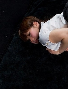 Ruru Sakurai gets fingered and poses a bunch while tied with red rope on the floor