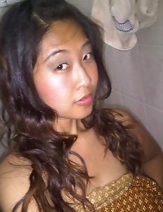 Thai GF displays her perky breasts